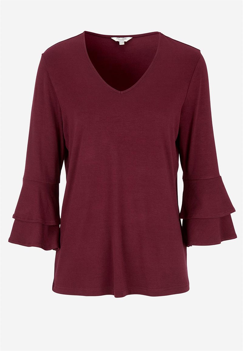 Jerseytopp med volangtermer