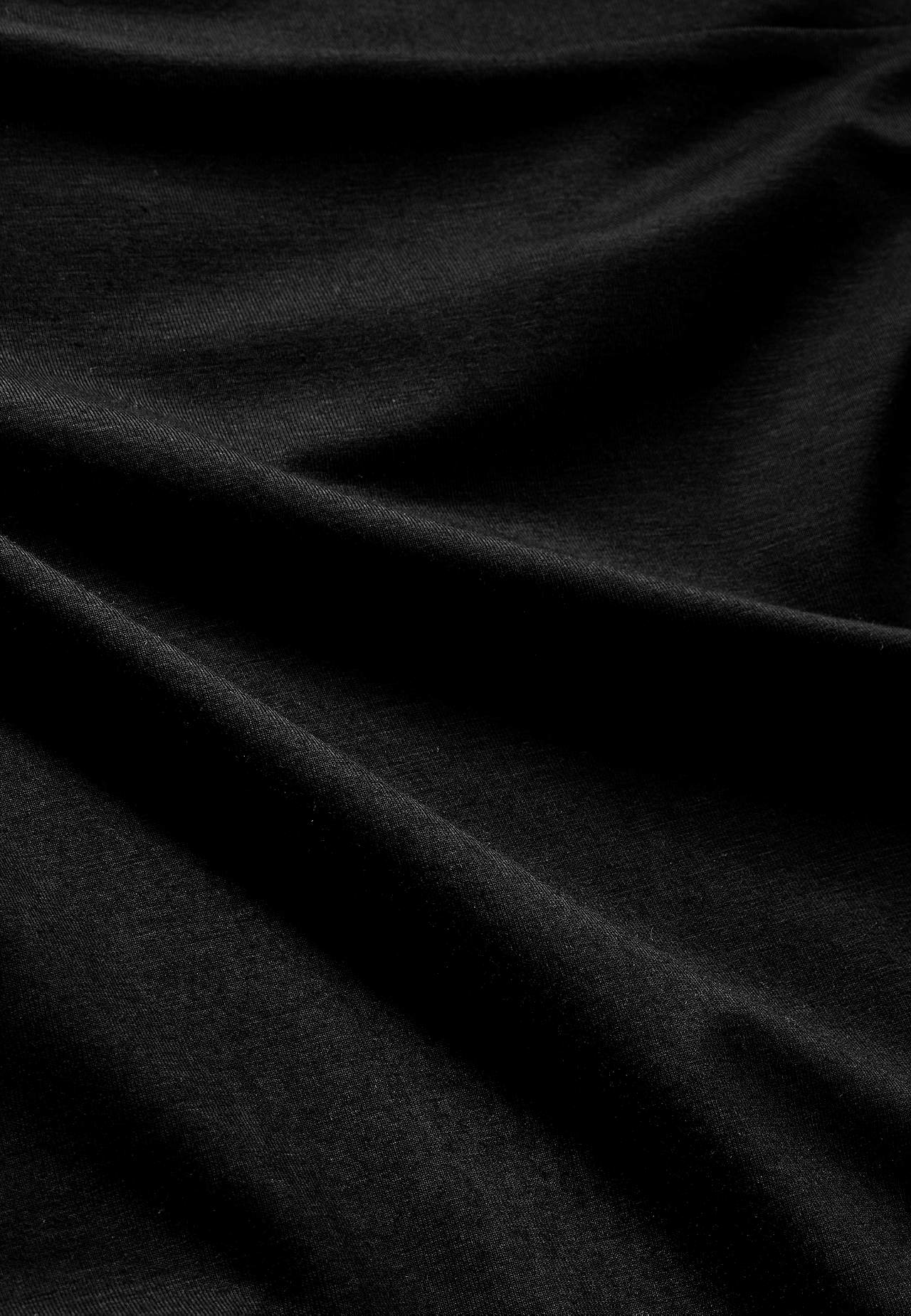 Langt, utsvingt jerseyskjørt