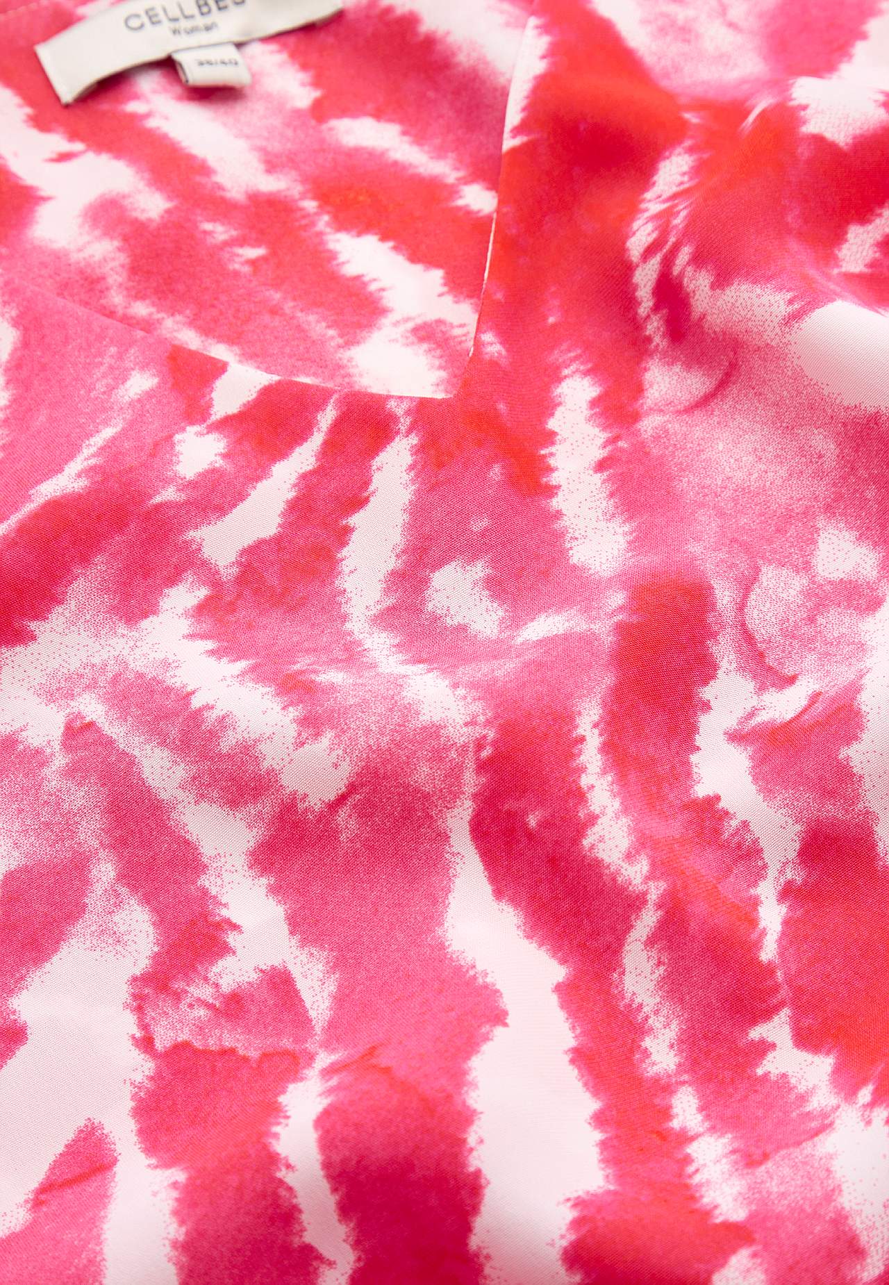 V-halset tunika med klokkeformet erme