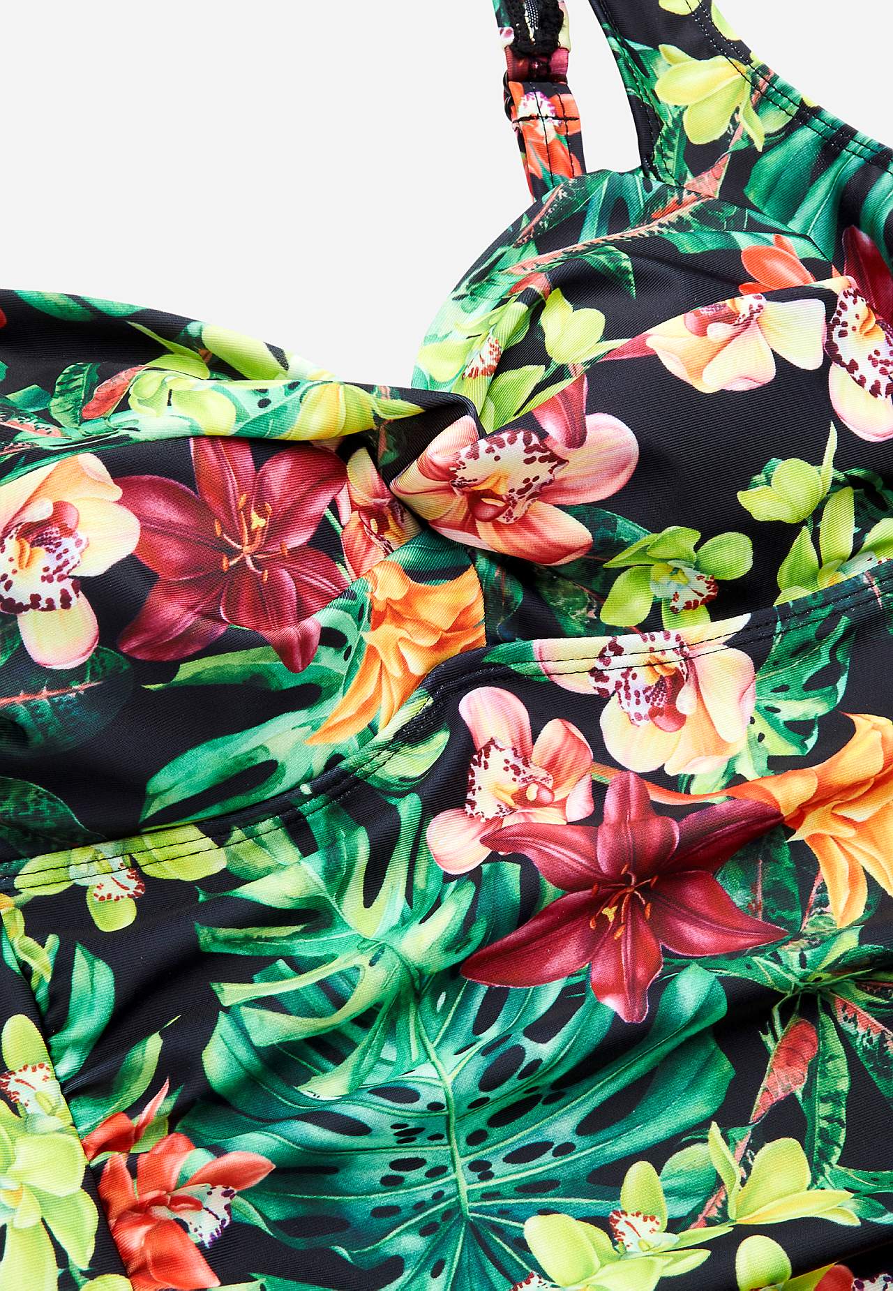 Tankinitopp med shaping-effekt og et blomstermønster