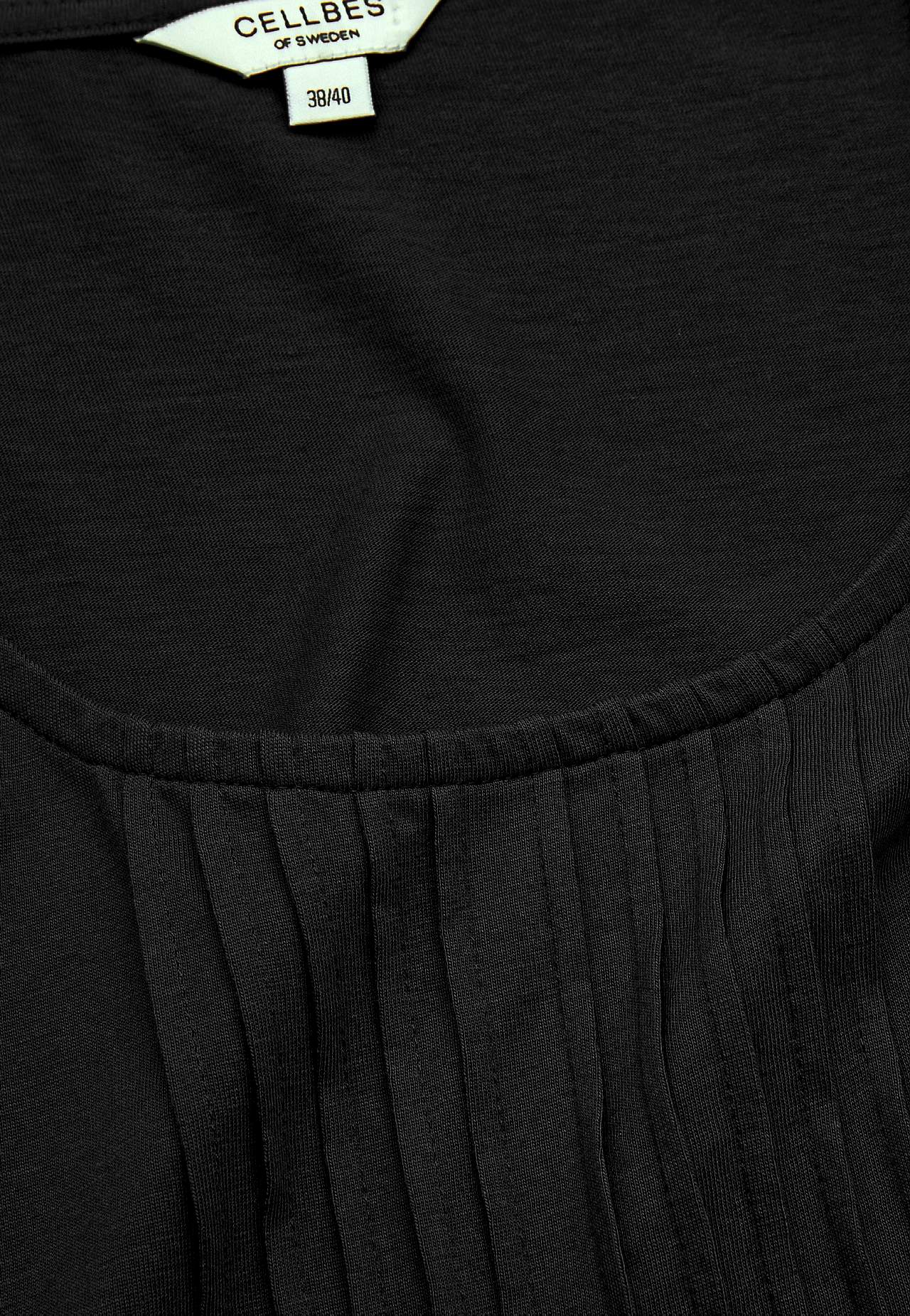 Singlet med dekorativ fold