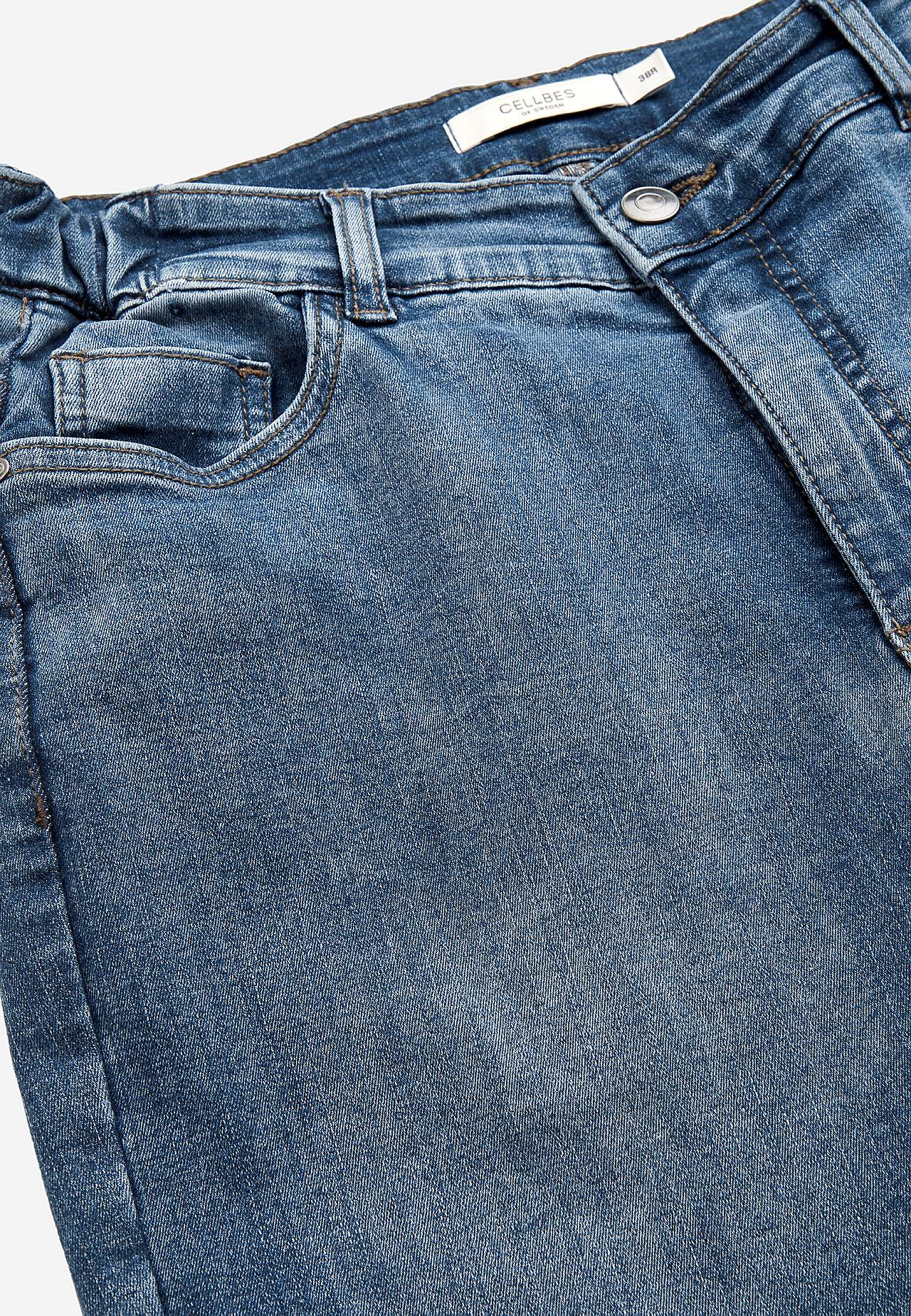 Jeans med strikk i sidene