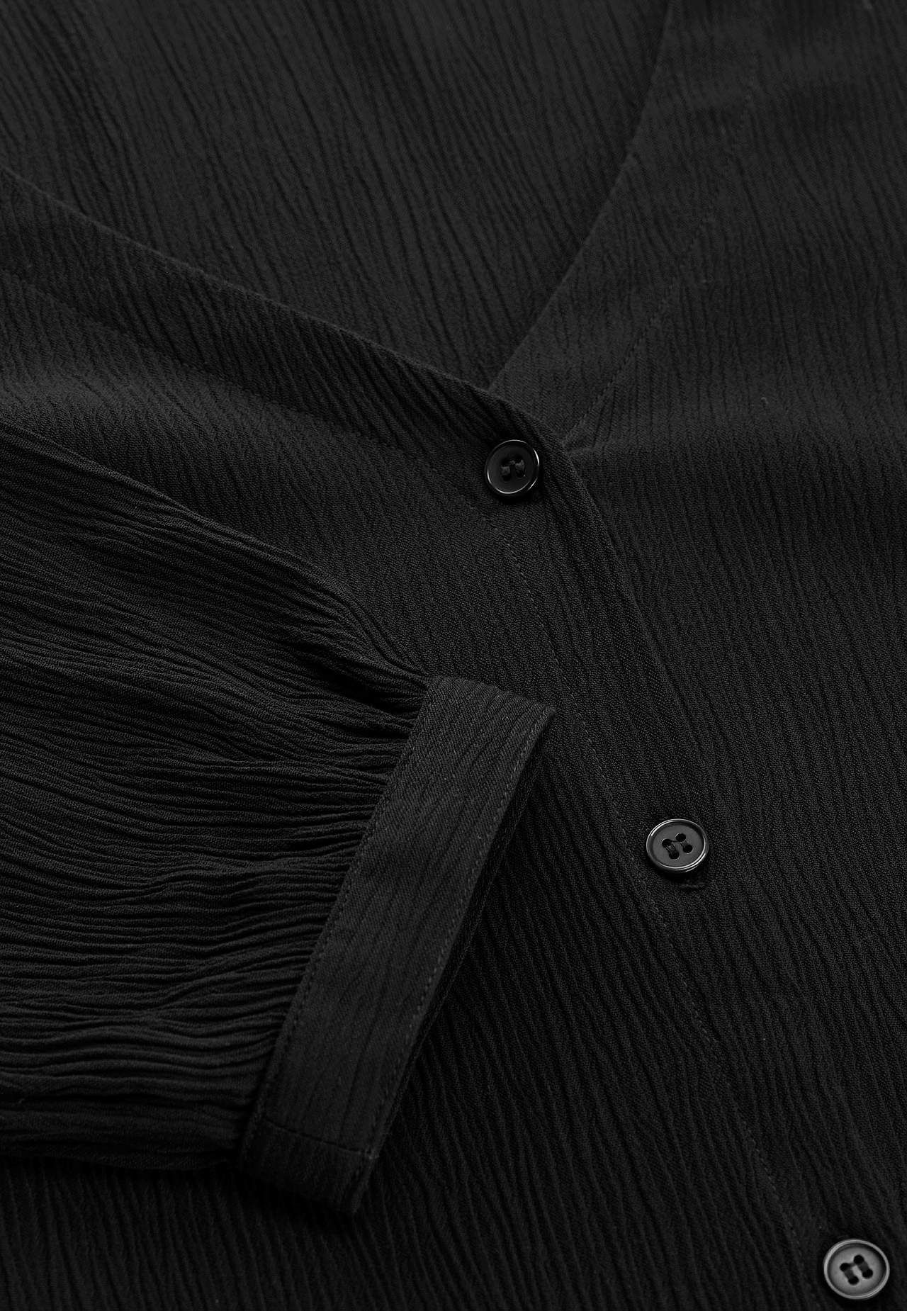 Bluse med crêpe-kvalitet