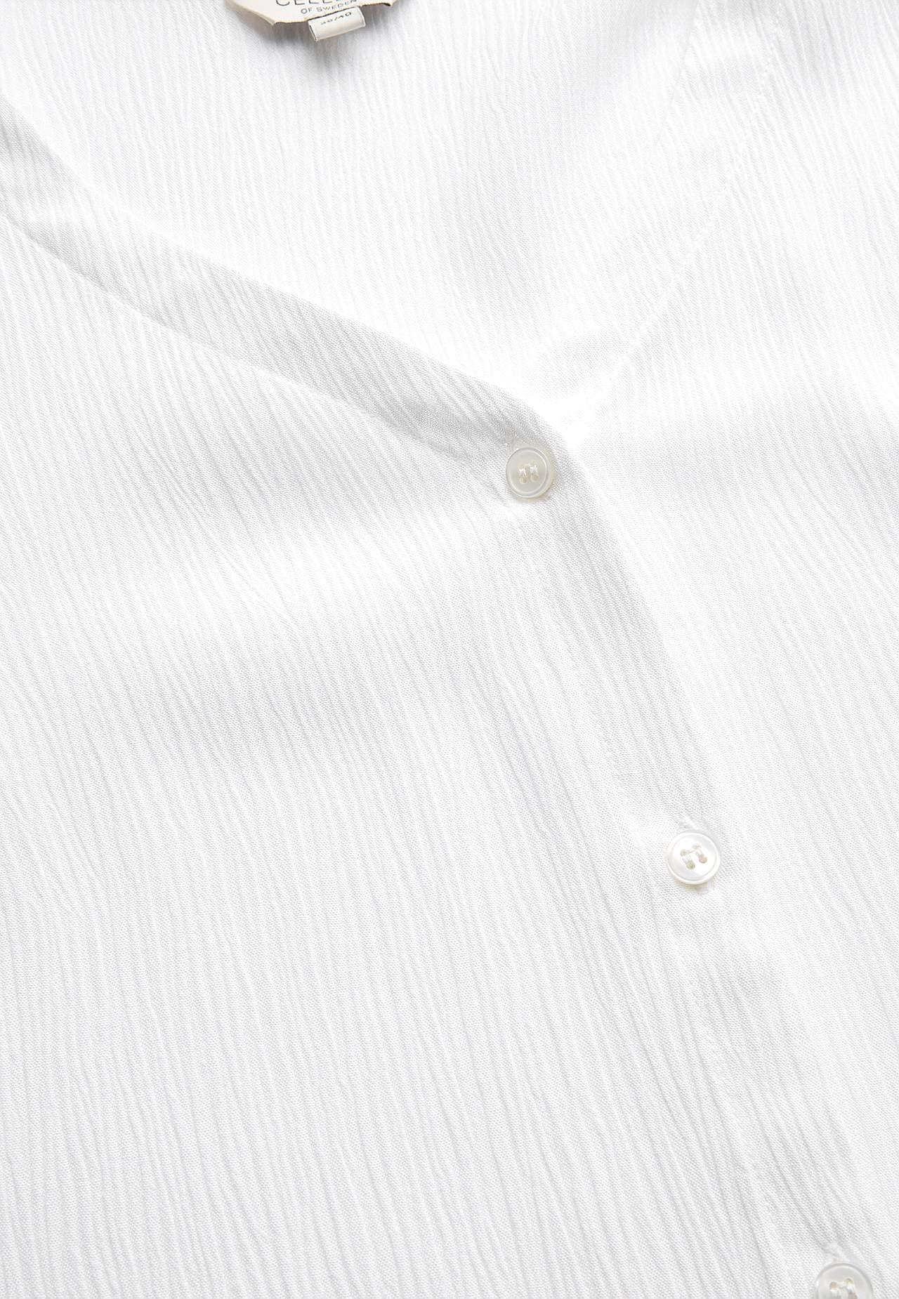 Bluse med crêpe-kvalitet