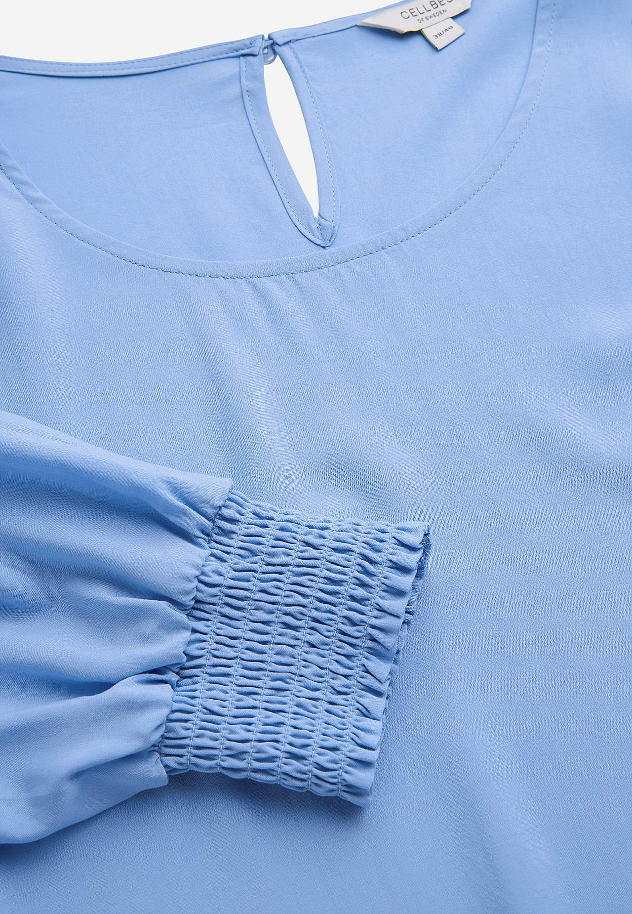Bluse med vaffelsøm i ermeslutten