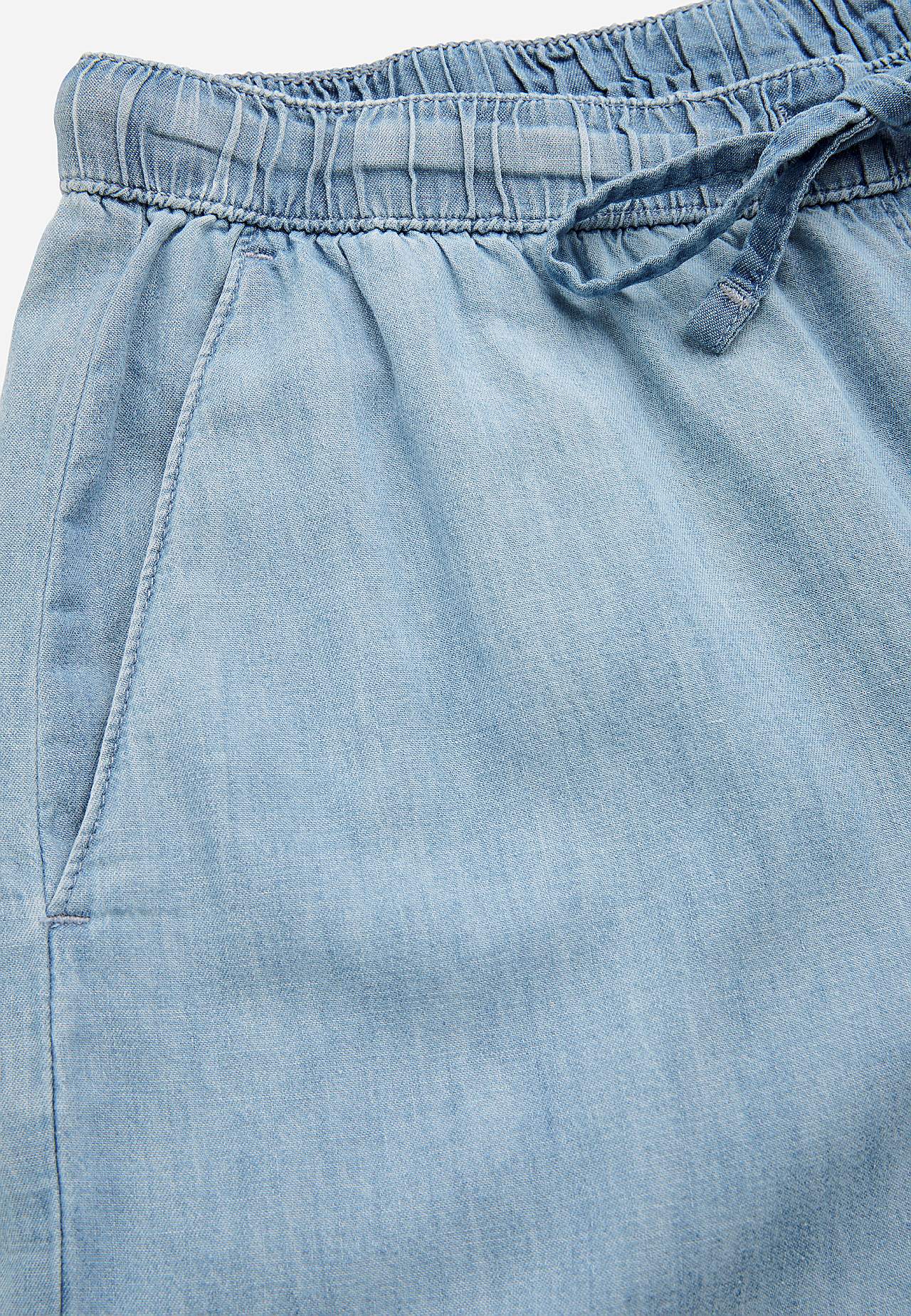 Bukse i denim med vide ben