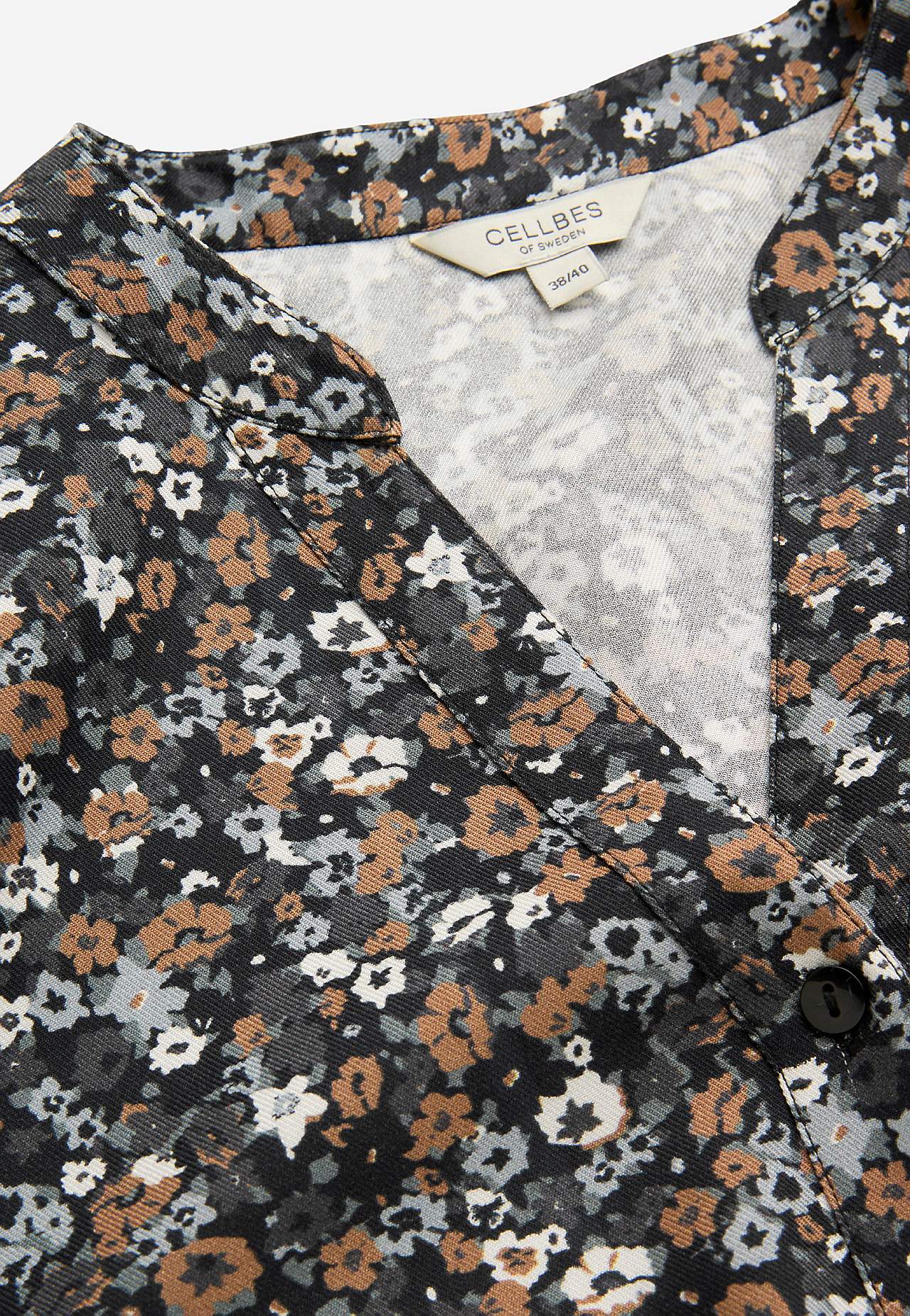 Vevet tunika med knapper