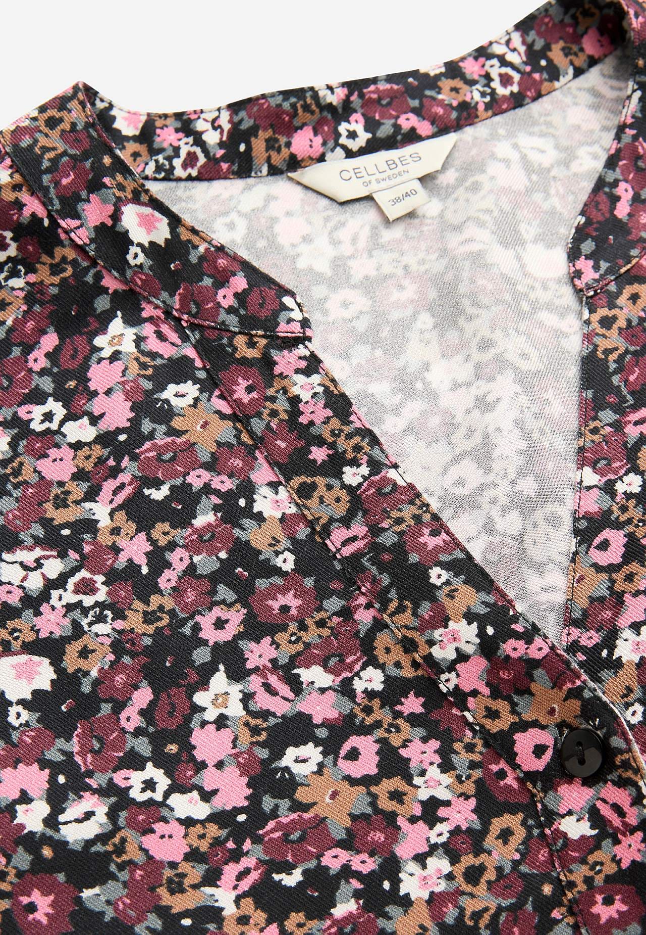 Vevet tunika med knapper