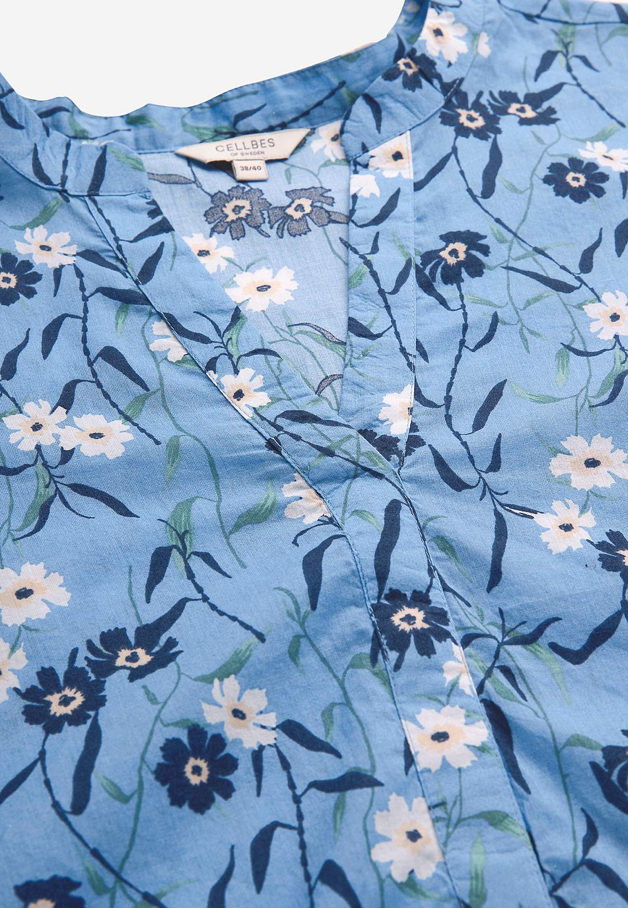 Vevet tunika med et blomstermønster