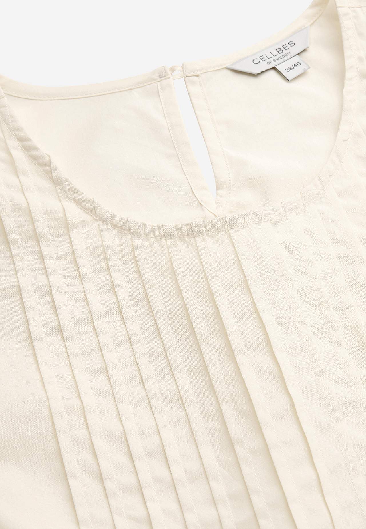 Ermløs bluse i bomullspoplin