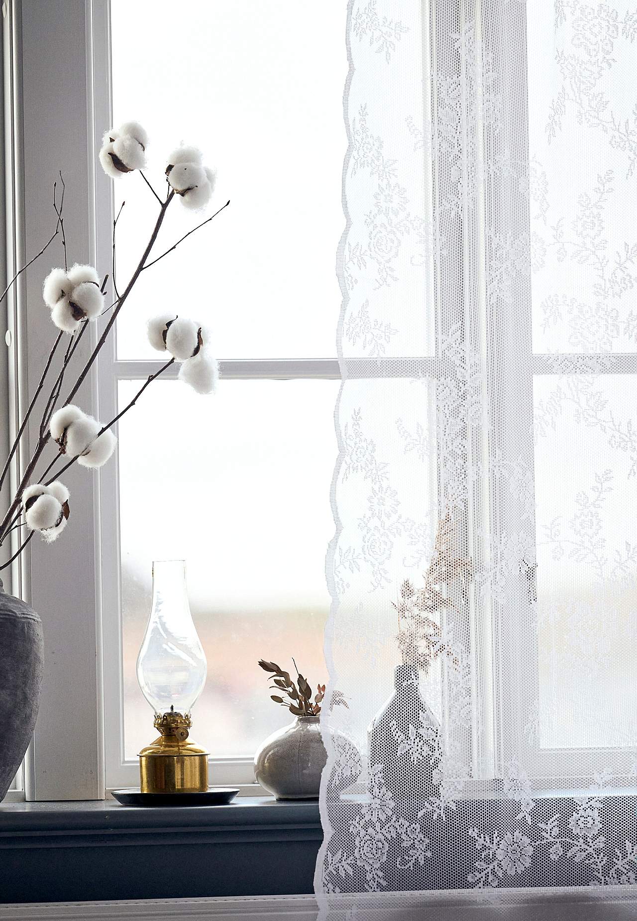 Mønstret blondegardin 2-pack