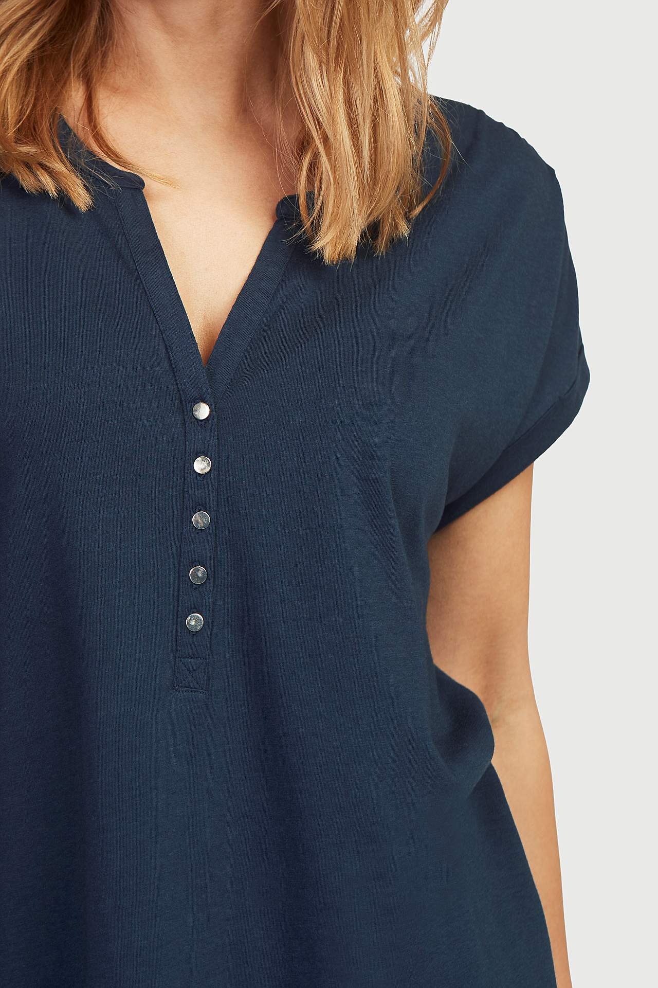 Jerseytopp med metalliske knapper