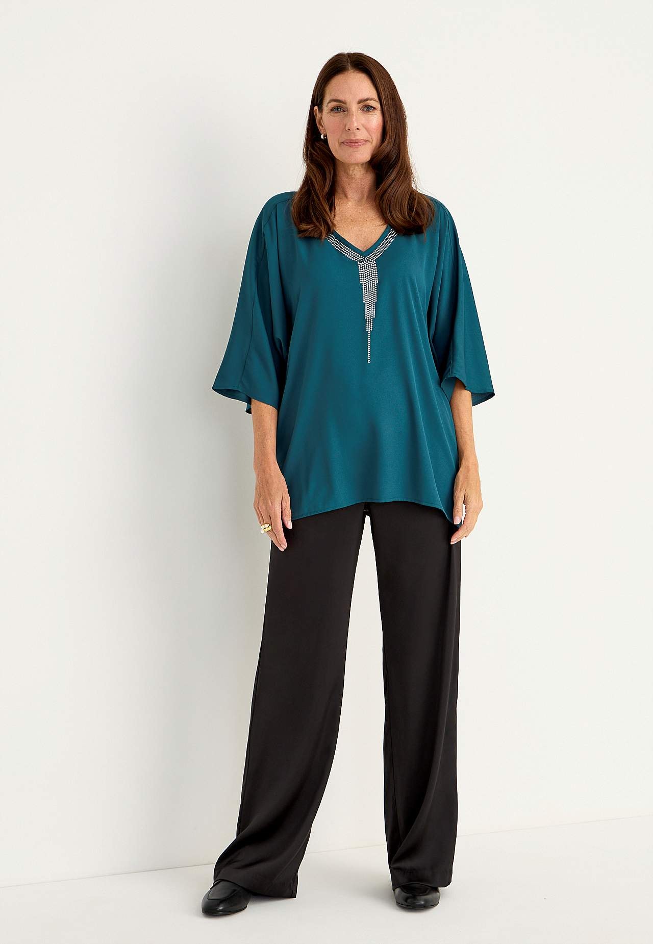 Festbluse med stiftdetaljer