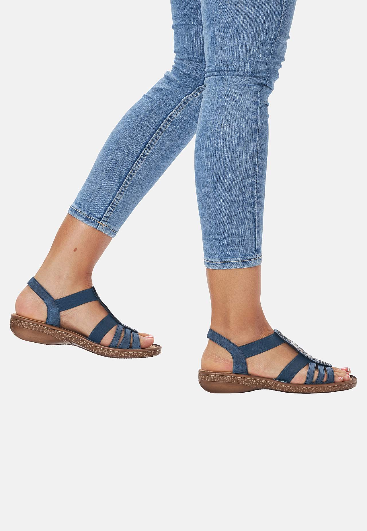 Sandal med stropper og vakre, dekorative steiner
