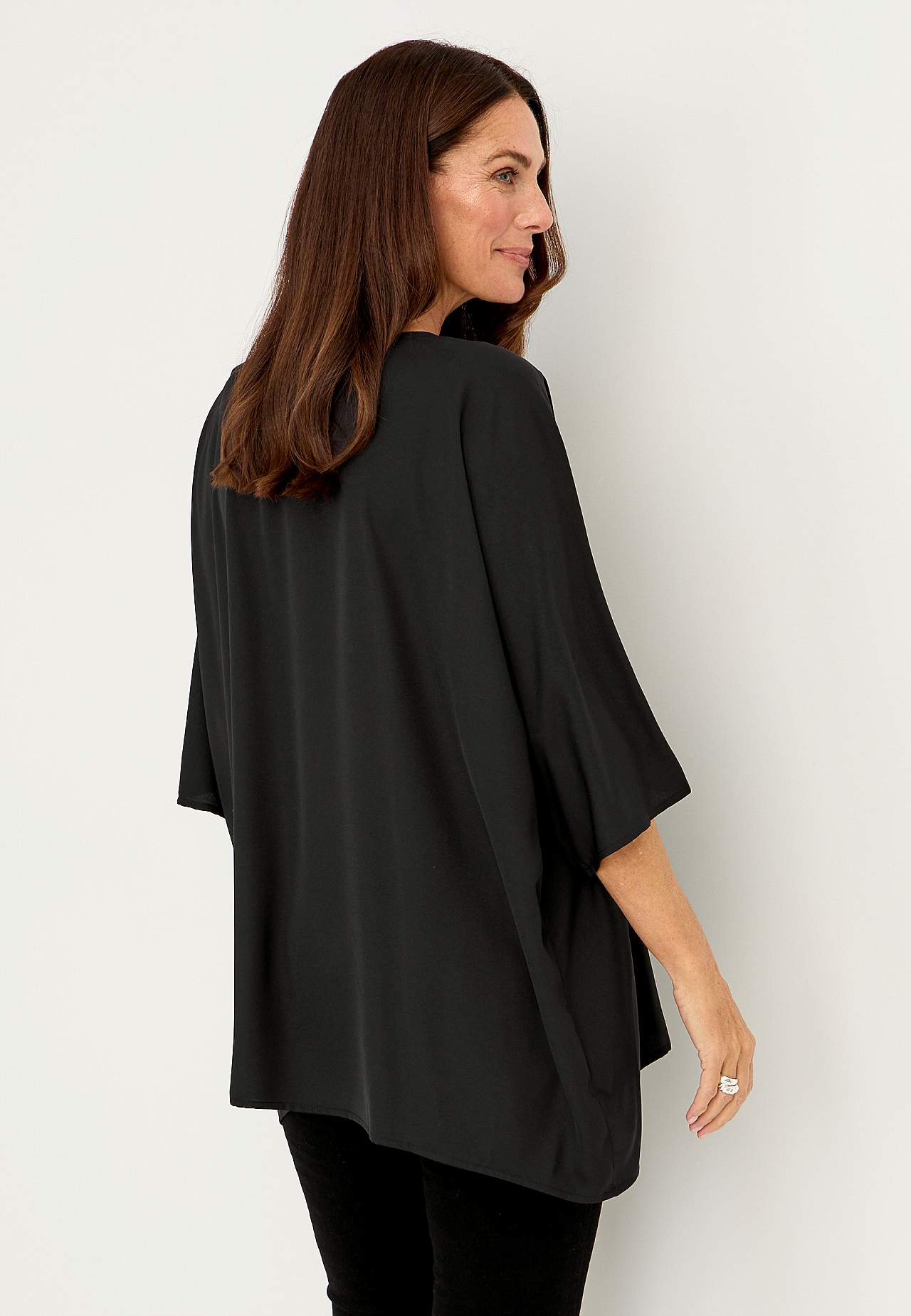Festbluse med stiftdetaljer