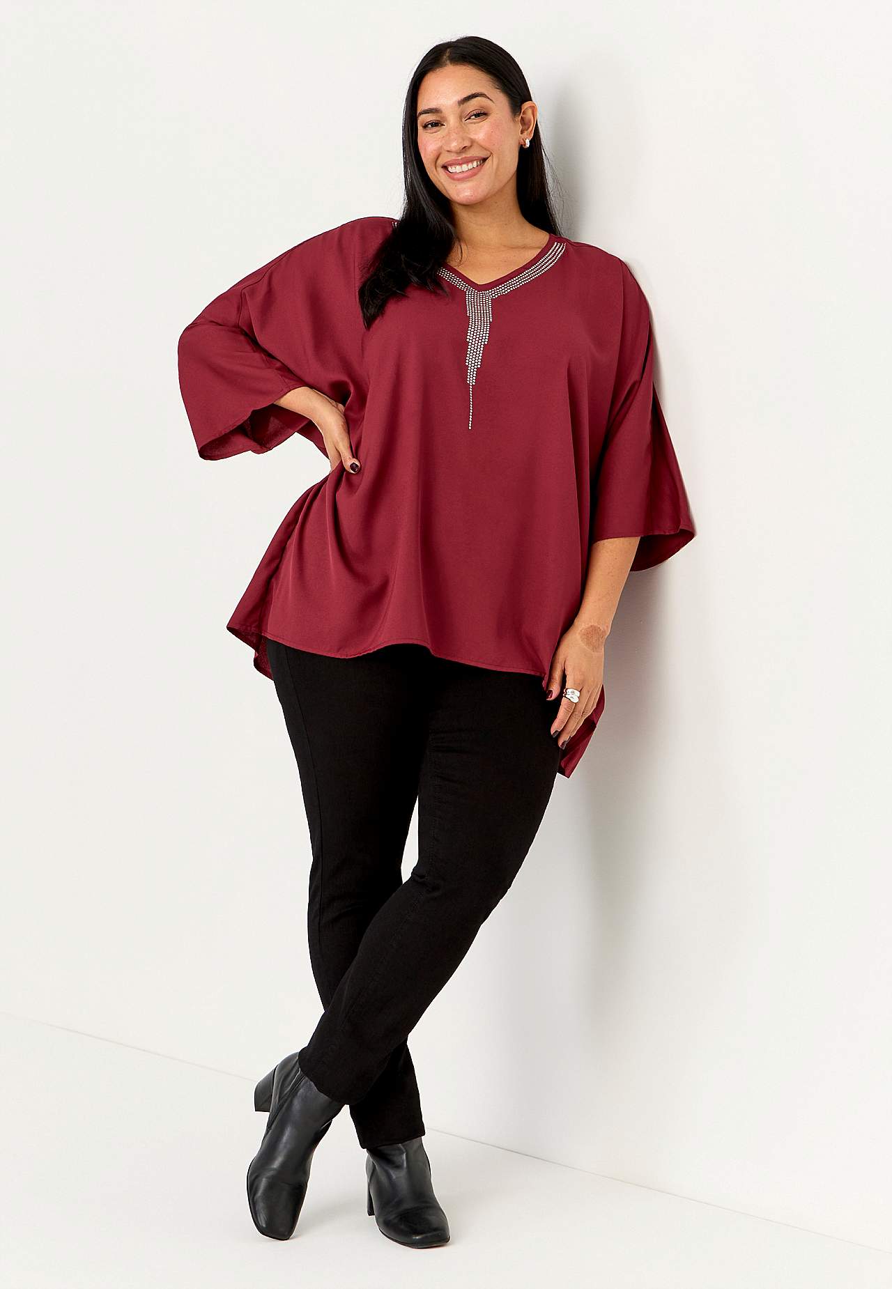 Festbluse med stiftdetaljer