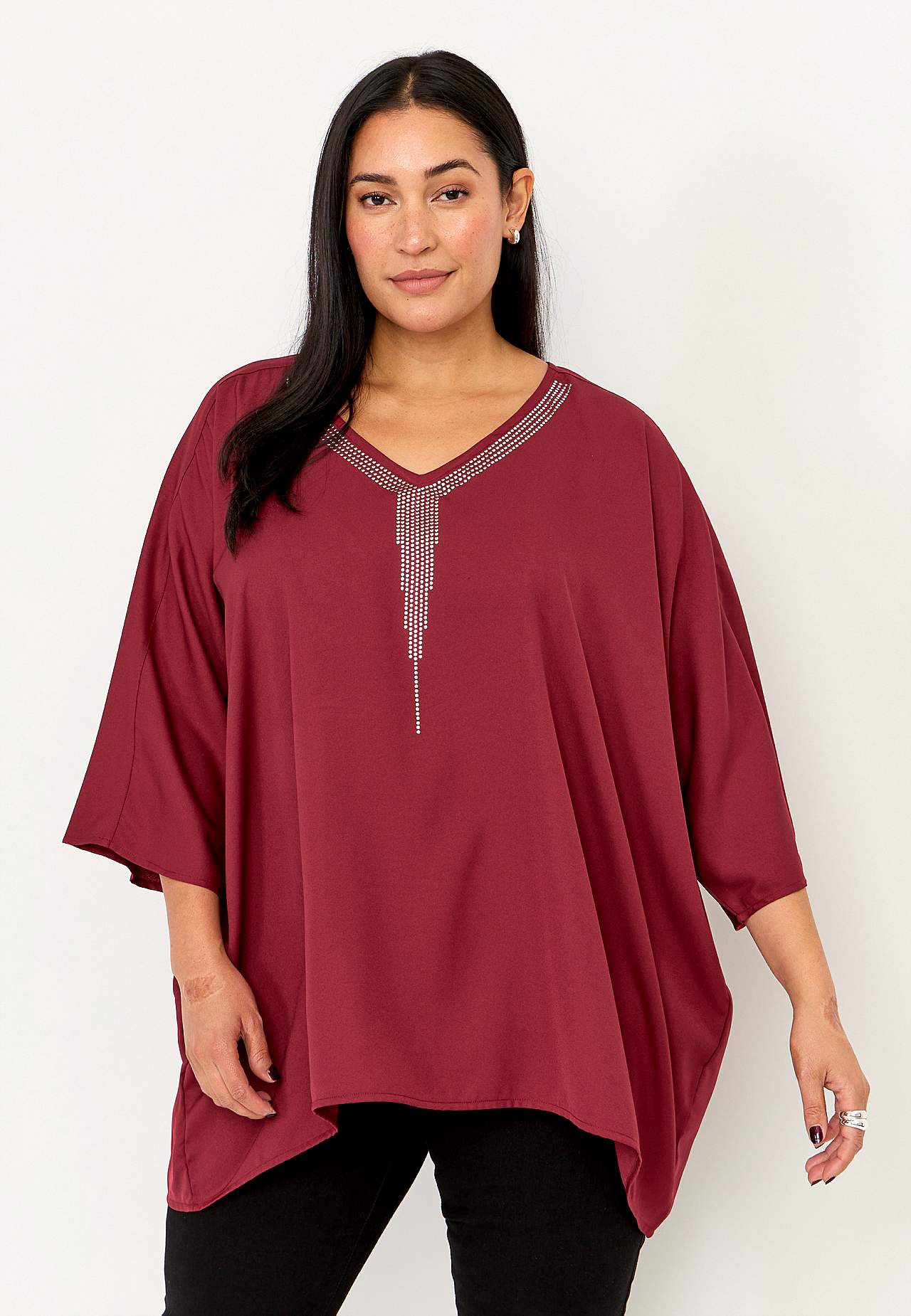 Festbluse med stiftdetaljer
