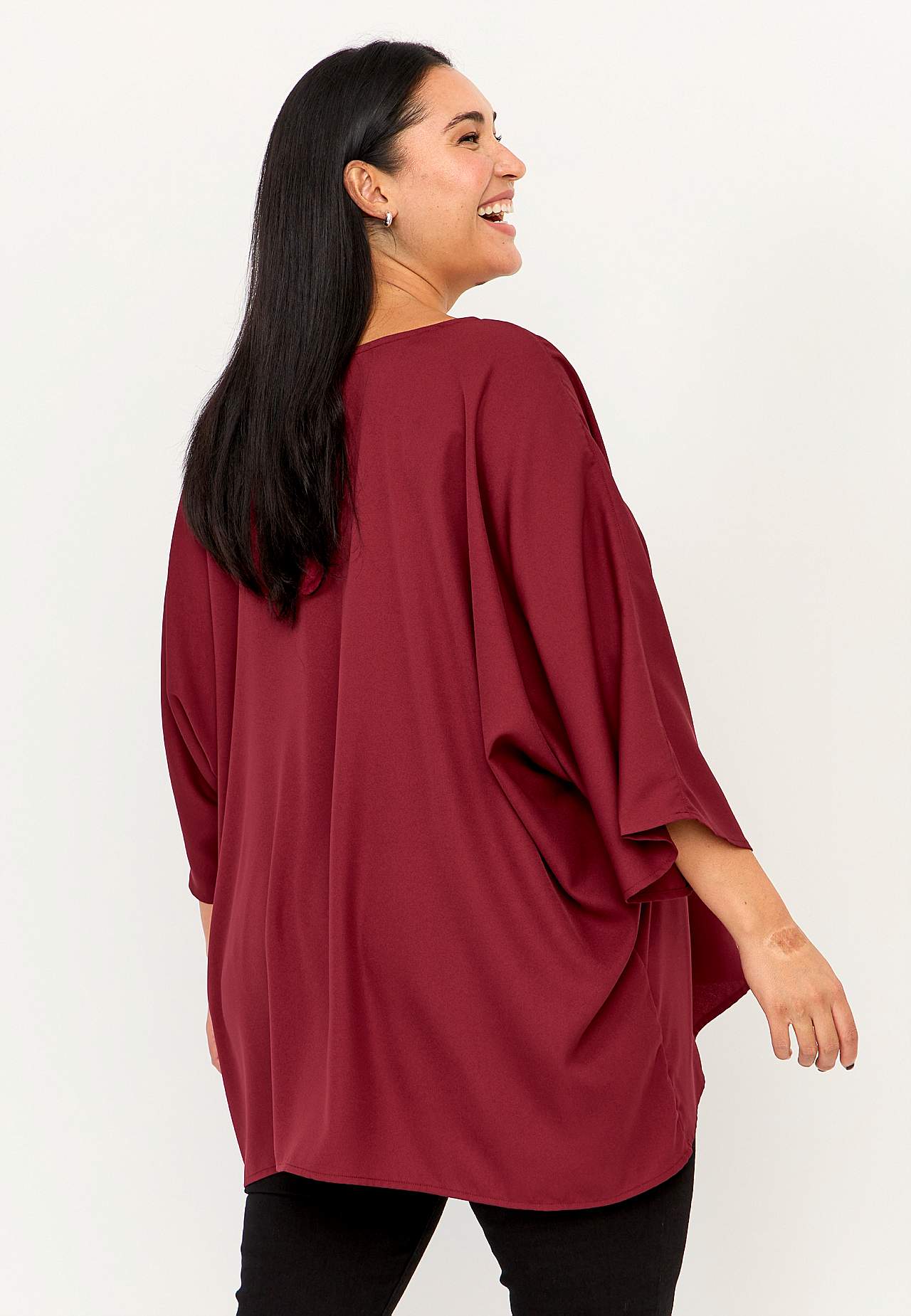Festbluse med stiftdetaljer