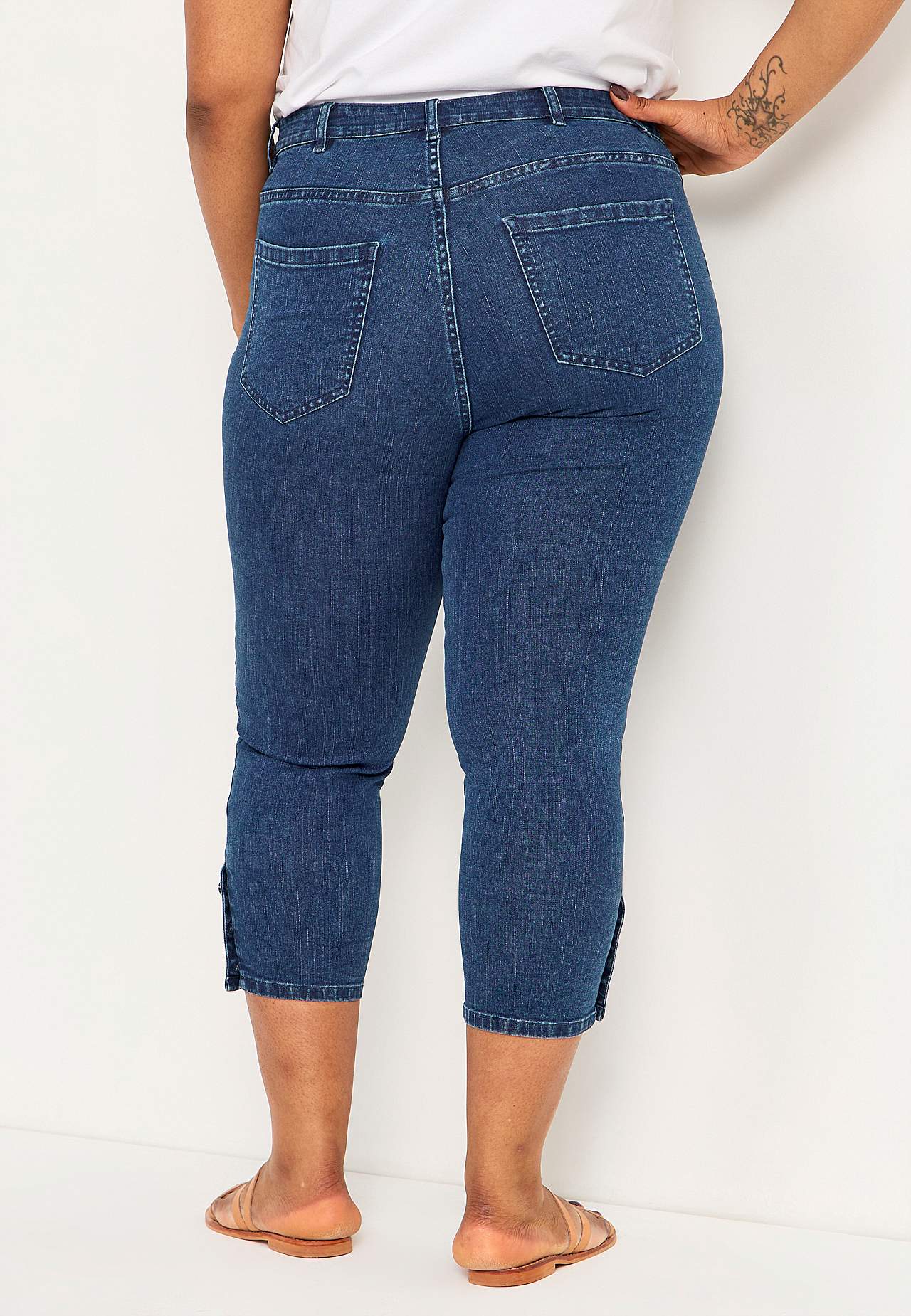 Caprijeans med design med fem lommer