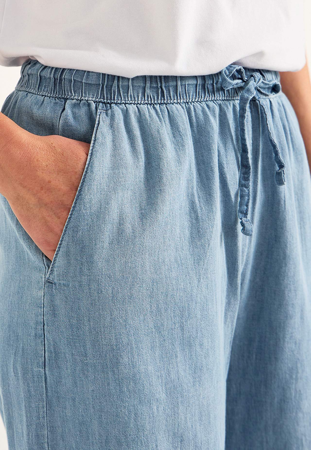 Bukse i denim med vide ben