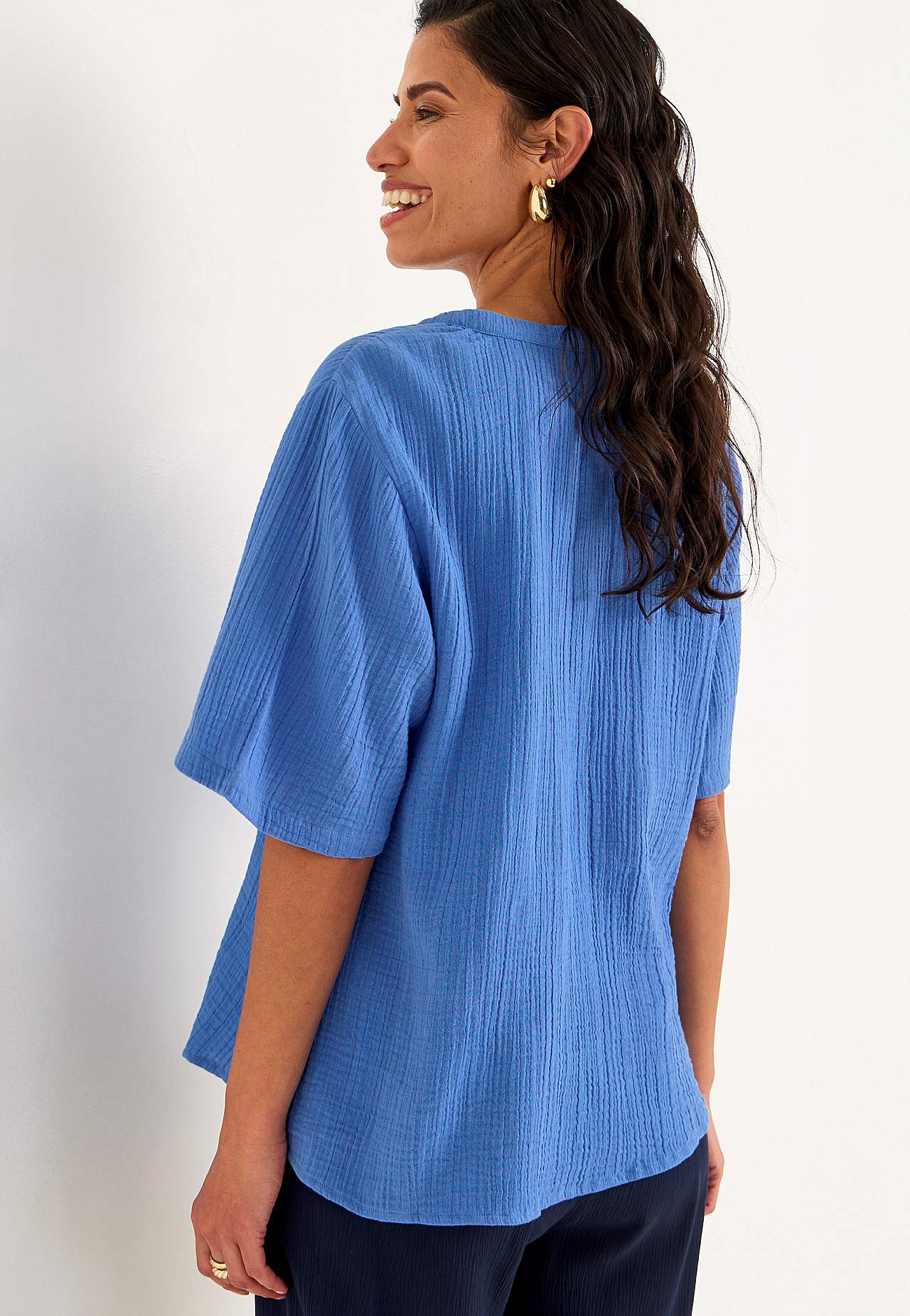Bluse i rynket bomull