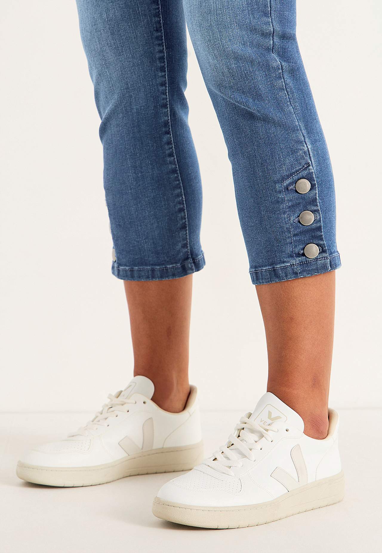 Caprijeans med design med fem lommer