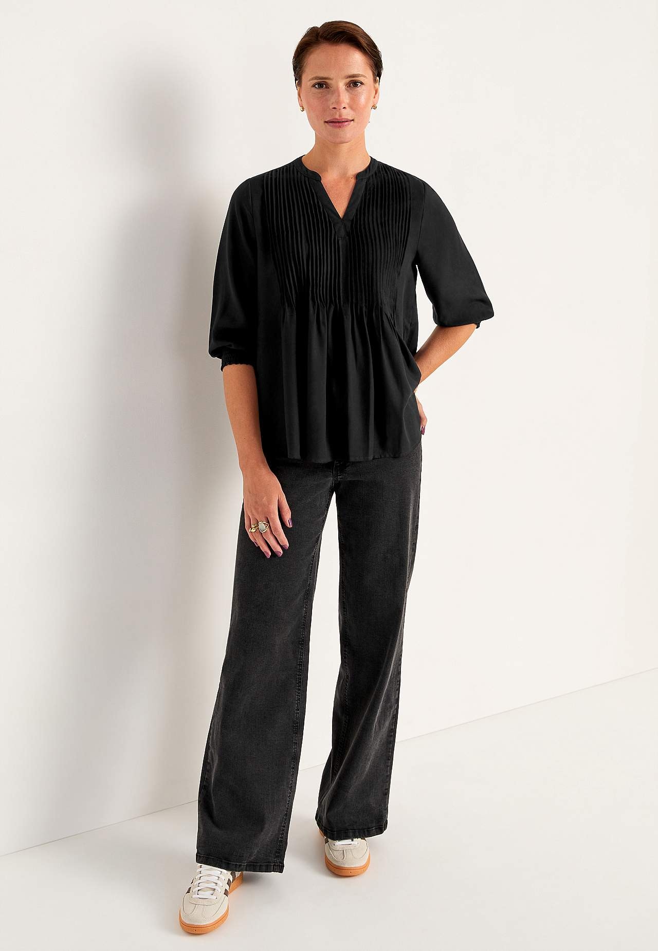 Bluse med sydde folder