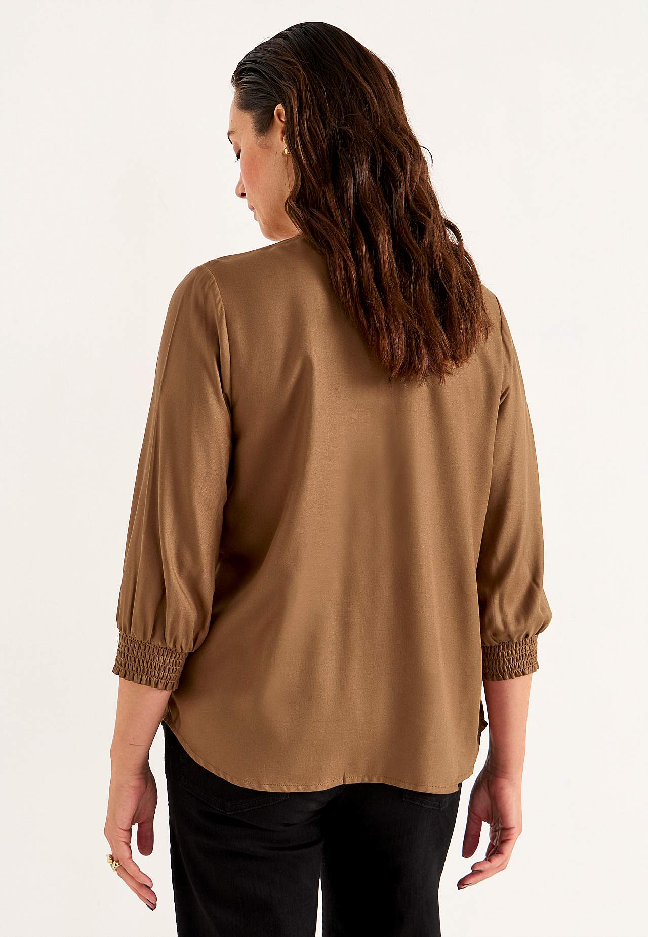 Bluse med sydde folder