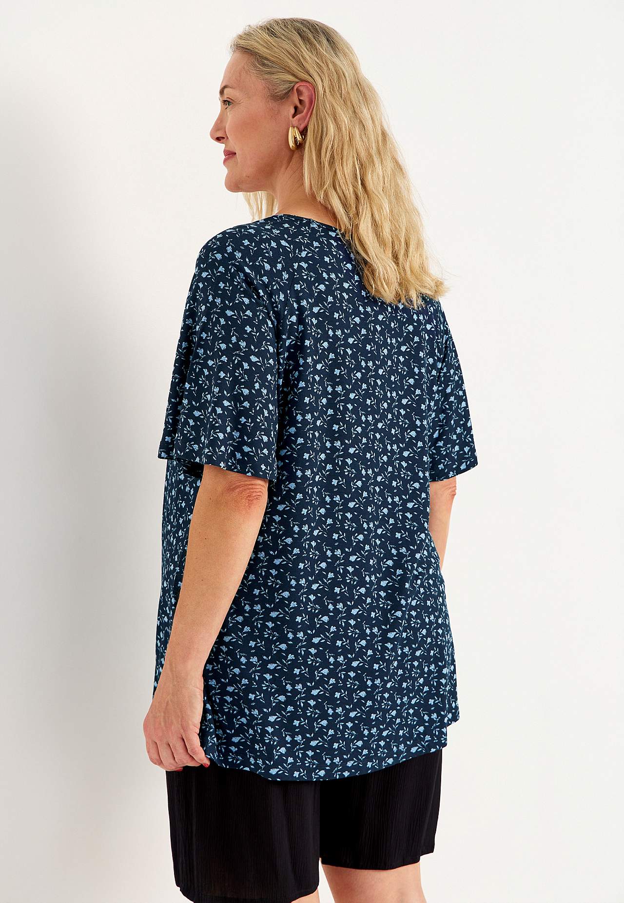 Jerseytunika med et blomstermønster