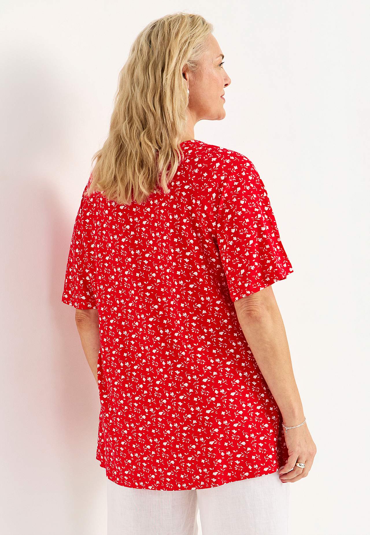 Jerseytunika med et blomstermønster