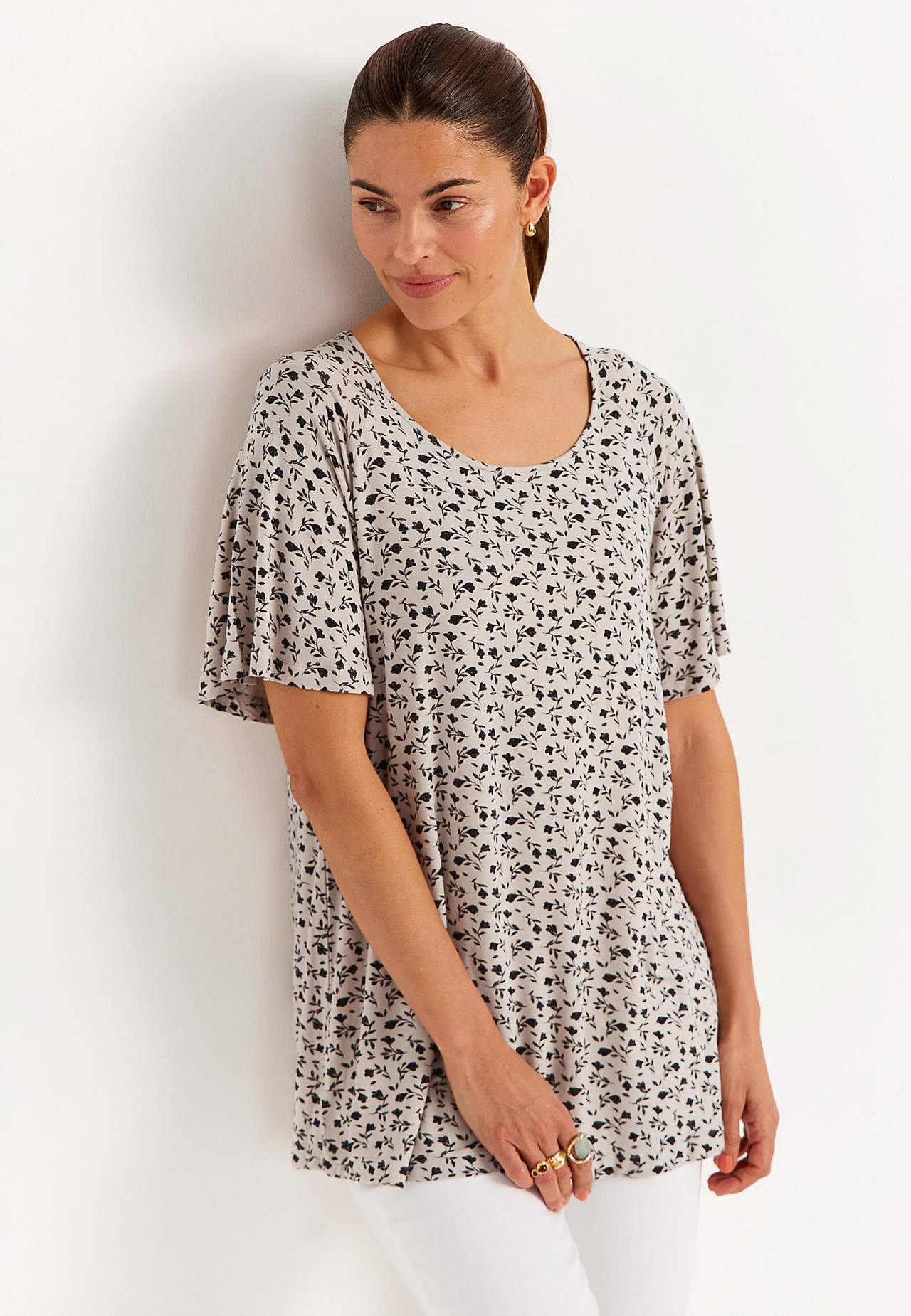 Jerseytunika med et blomstermønster