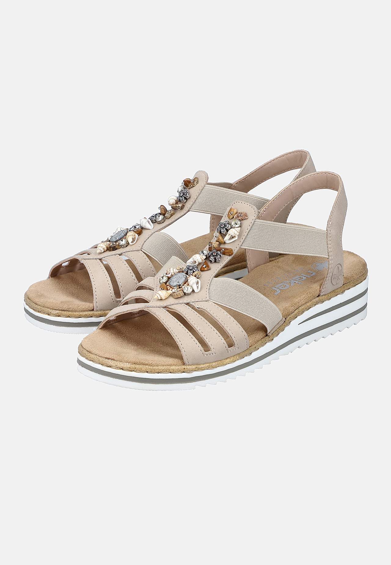 Sandaler med dekorative skjell og steiner