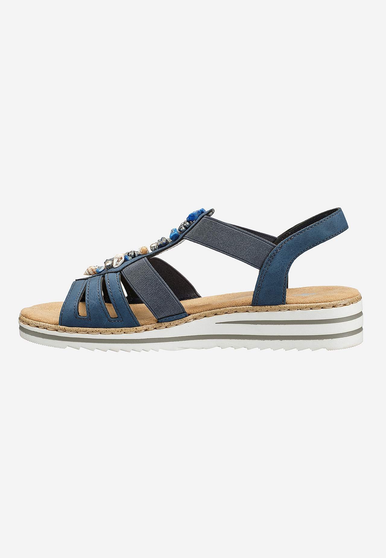 Sandaler med dekorative skjell og steiner
