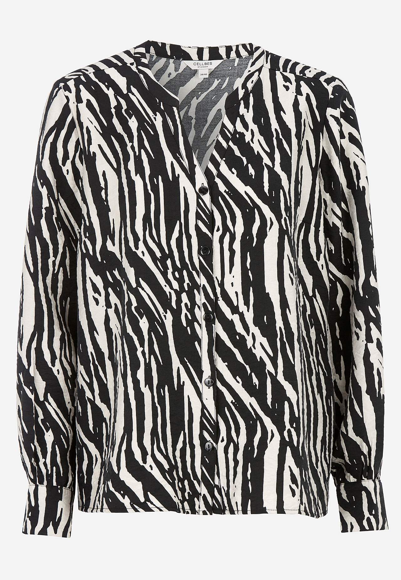 Vevet bluse med knapper