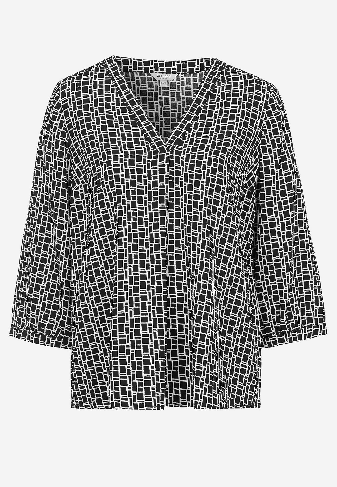 V-halset, vevet bluse