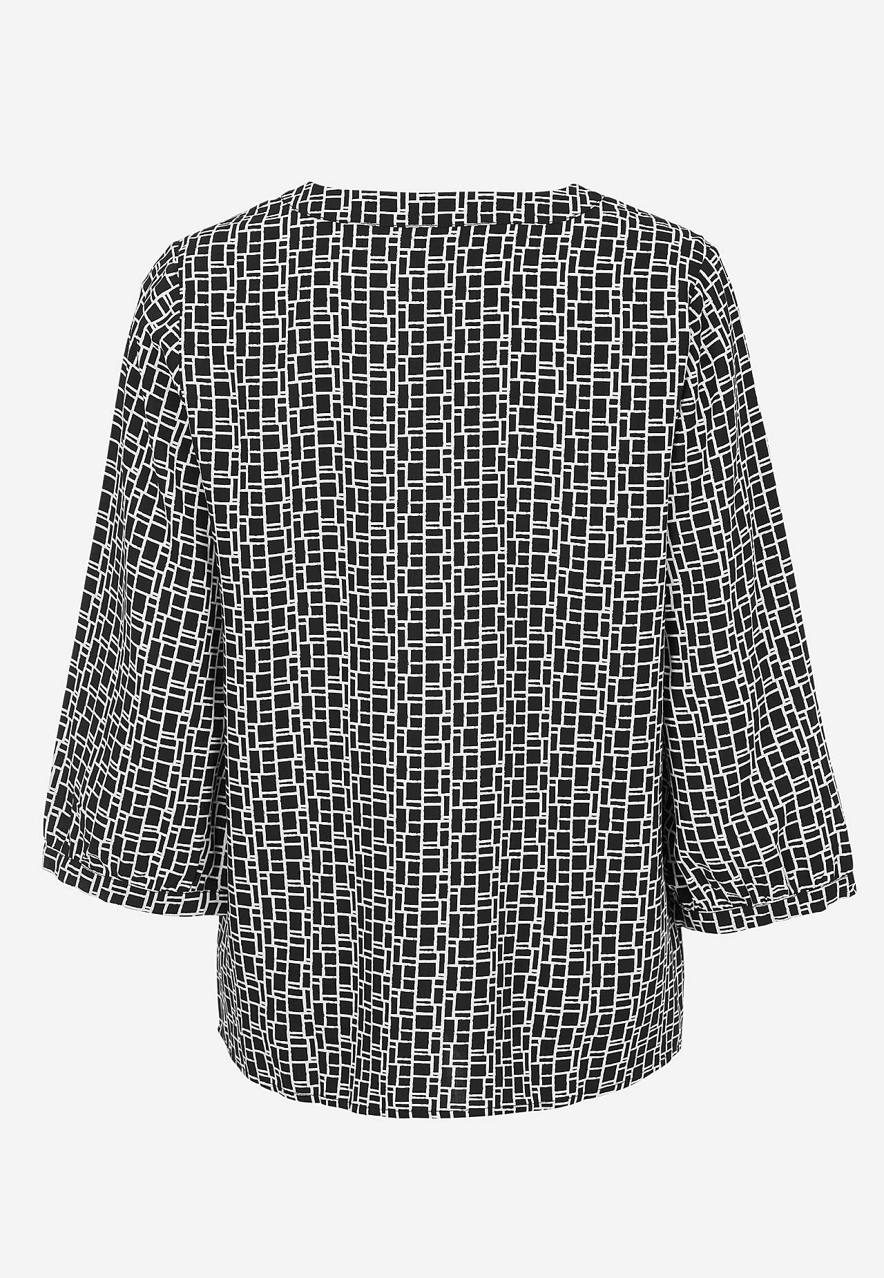 V-halset, vevet bluse