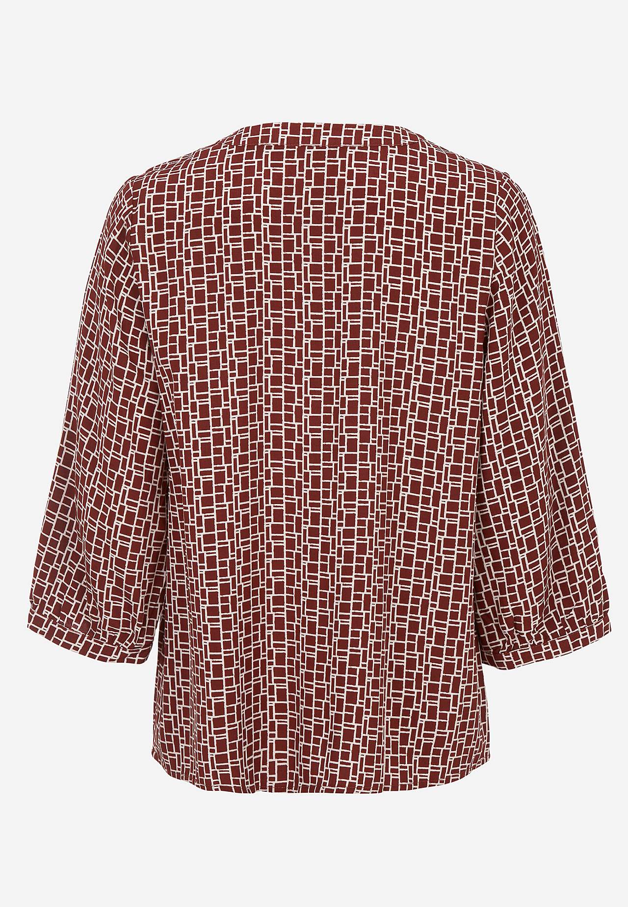 V-halset, vevet bluse
