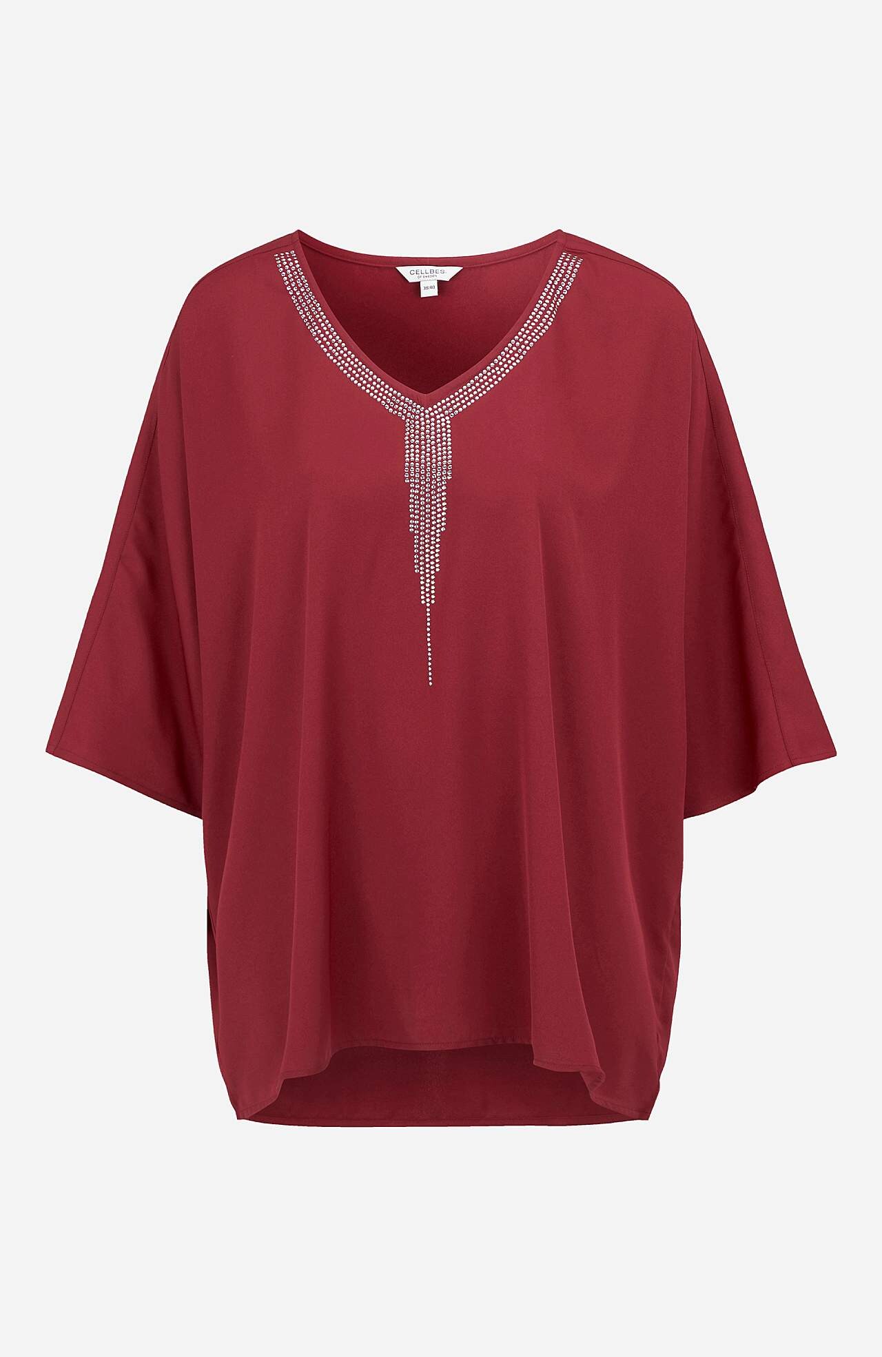 Festbluse med stiftdetaljer