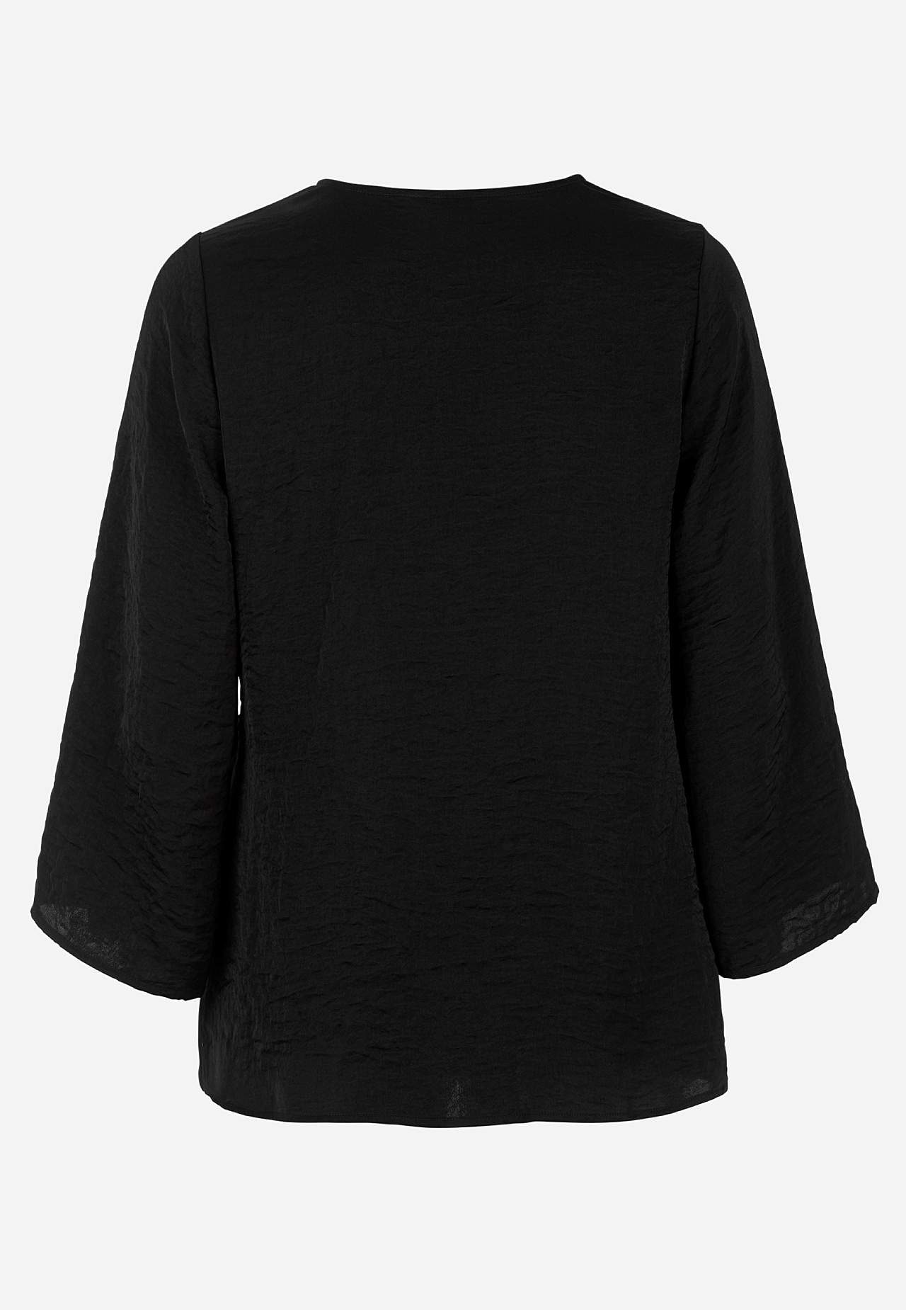 Bluse med knytebånd