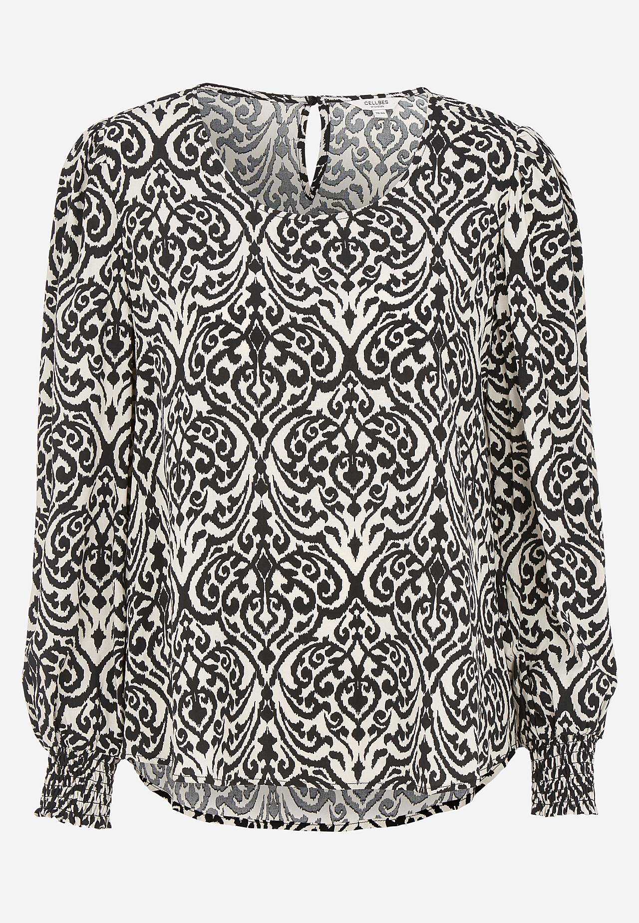 Bluse med vaffelsøm i ermeslutten
