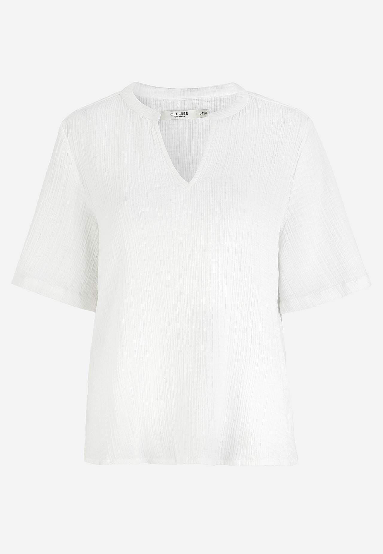 Bluse i rynket bomull