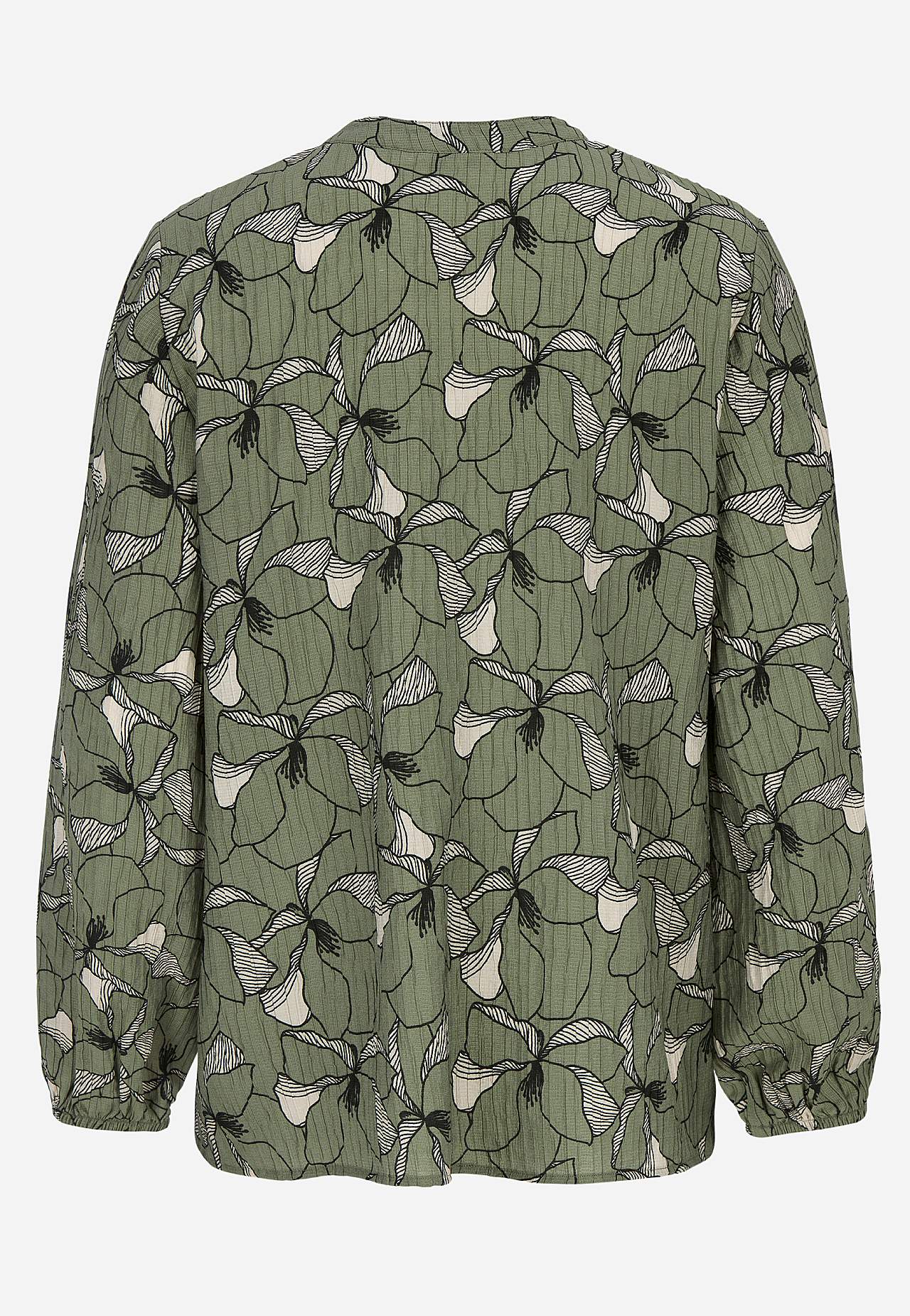 Bluse med et blomstermønster og struktur