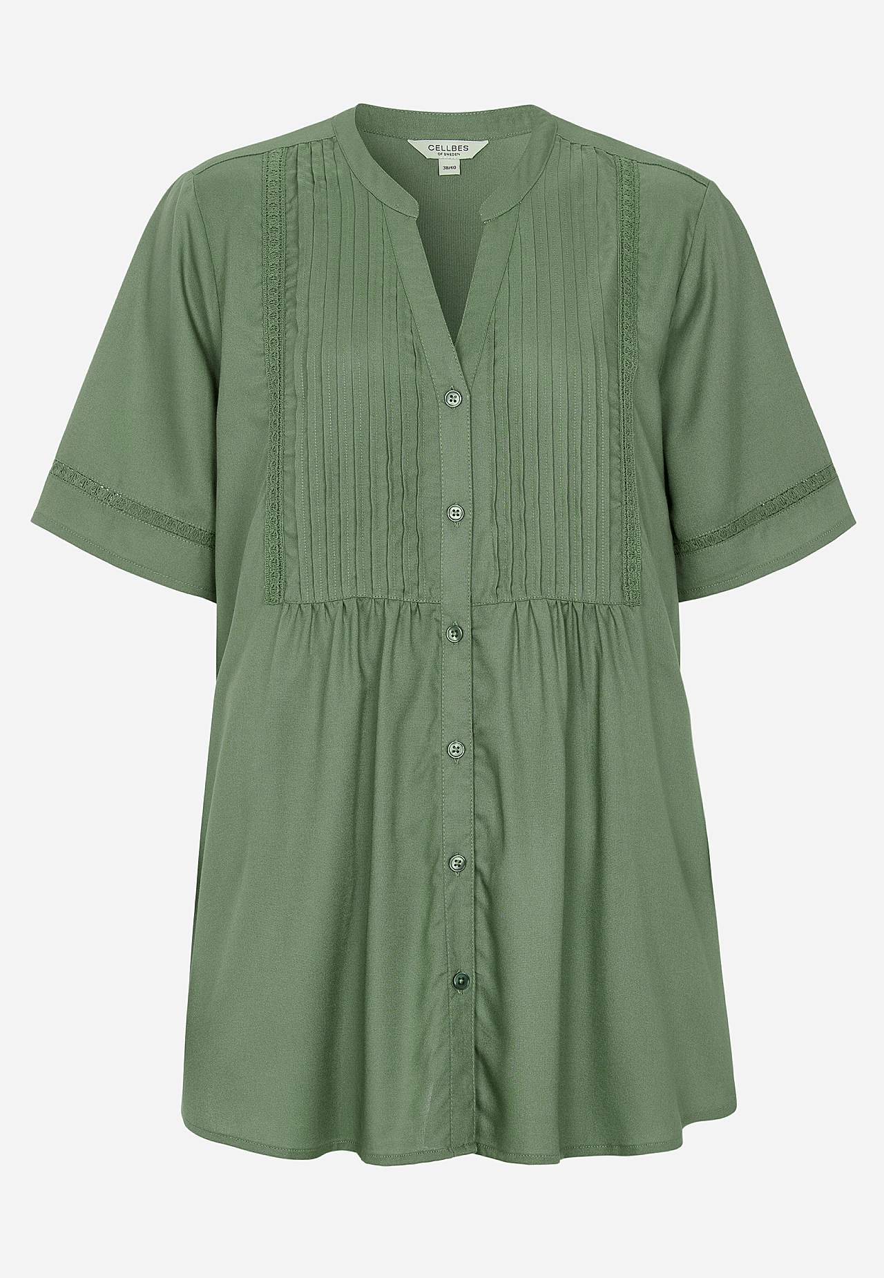 Vevet tunika med blondekanter