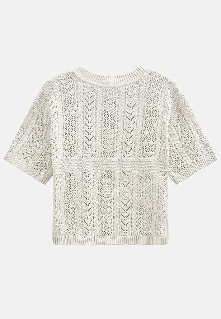 Strikket genser med hullmønster